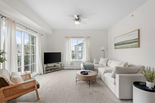 4418-99 Copperstone Park Se, Calgary, AB - Indoor Photo Showing Living Room