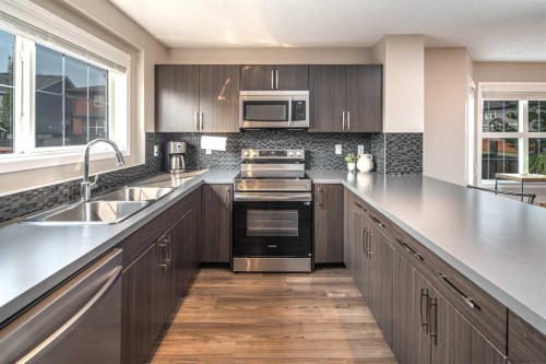 264 Chaparral Valley Square Se, Calgary, AB - Indoor Photo Showing Kitchen With Double Sink With Upgraded Kitchen