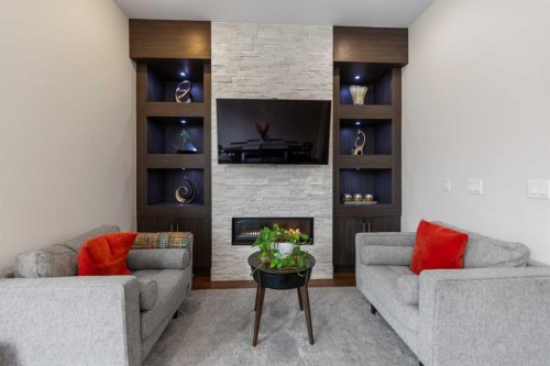 2020 37 Street Sw, Calgary, AB - Indoor Photo Showing Living Room With Fireplace