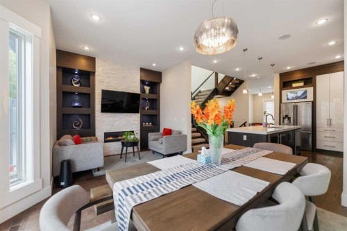 2020 37 Street Sw, Calgary, AB - Indoor Photo Showing Dining Room With Fireplace