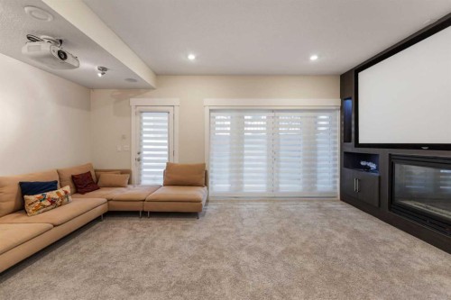 2020 37 Street Sw, Calgary, AB - Indoor Photo Showing Living Room With Fireplace