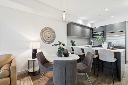 208-323 20 Avenue Sw, Calgary, AB - Indoor Photo Showing Dining Room