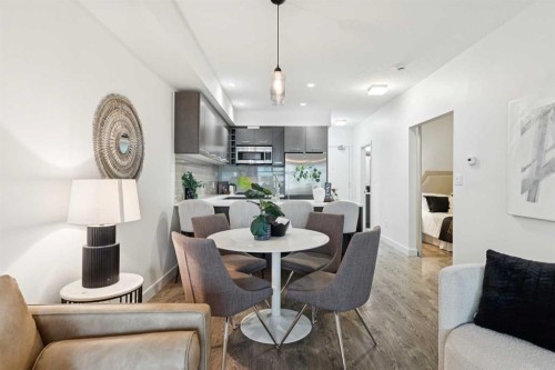 208-323 20 Avenue Sw, Calgary, AB - Indoor Photo Showing Dining Room