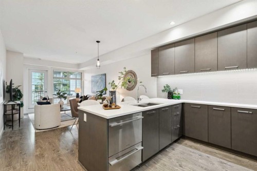 208-323 20 Avenue Sw, Calgary, AB - Indoor Photo Showing Kitchen With Double Sink With Upgraded Kitchen