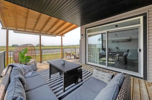 268 Rainbow Falls Way, Chestermere, AB - Outdoor With Deck Patio Veranda With Exterior