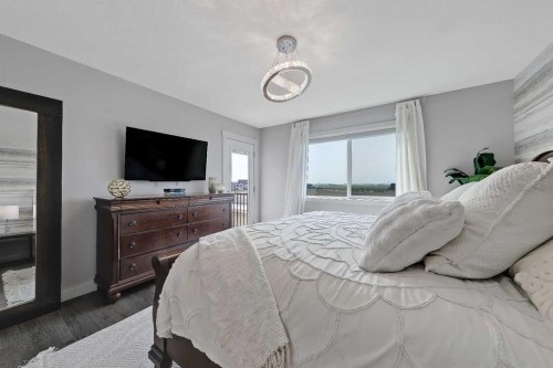 268 Rainbow Falls Way, Chestermere, AB - Indoor Photo Showing Bedroom