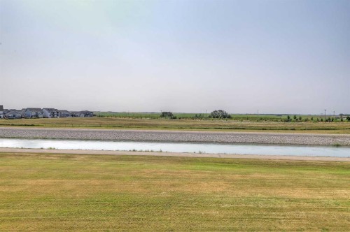 268 Rainbow Falls Way, Chestermere, AB - Outdoor With Body Of Water With View