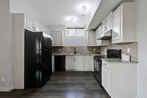 268 Rainbow Falls Way, Chestermere, AB - Indoor Photo Showing Kitchen