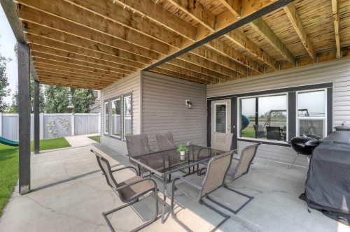 268 Rainbow Falls Way, Chestermere, AB - Outdoor With Deck Patio Veranda With Exterior