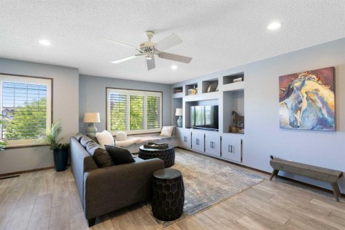382 Tuscany Ravine Road Nw, Calgary, AB - Indoor Photo Showing Living Room