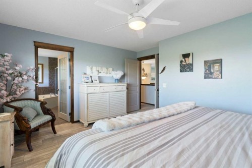 382 Tuscany Ravine Road Nw, Calgary, AB - Indoor Photo Showing Bedroom