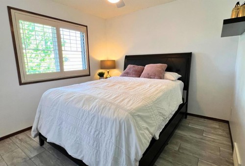 382 Tuscany Ravine Road Nw, Calgary, AB - Indoor Photo Showing Bedroom