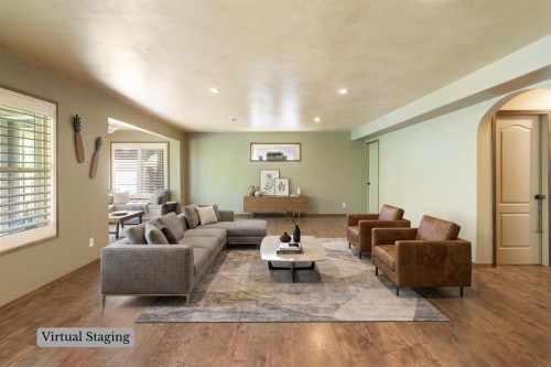 382 Tuscany Ravine Road Nw, Calgary, AB - Indoor Photo Showing Living Room