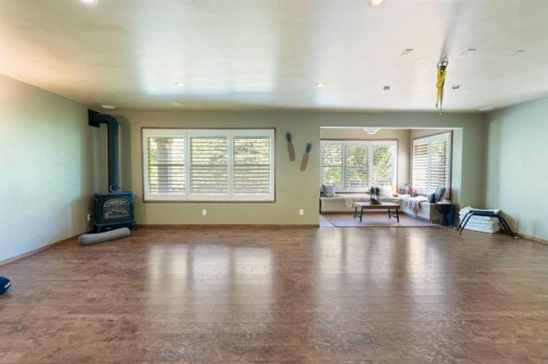382 Tuscany Ravine Road Nw, Calgary, AB - Indoor Photo Showing Living Room With Fireplace