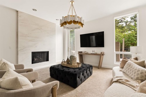 79 Bel-Aire Place Sw, Calgary, AB - Indoor Photo Showing Living Room With Fireplace