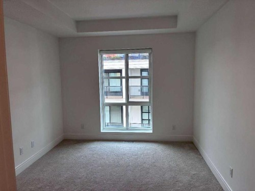 103-4270 Norford Avenue Nw, Calgary, AB - Indoor Photo Showing Other Room