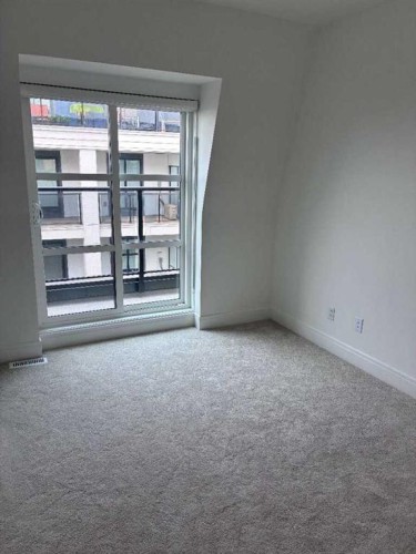 103-4270 Norford Avenue Nw, Calgary, AB - Indoor Photo Showing Other Room