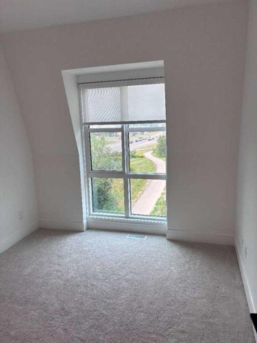 103-4270 Norford Avenue Nw, Calgary, AB - Indoor Photo Showing Other Room