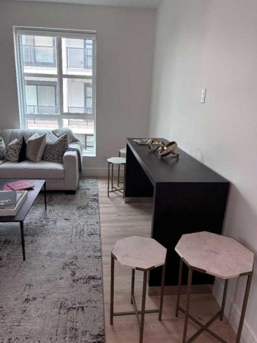 103-4270 Norford Avenue Nw, Calgary, AB - Indoor Photo Showing Living Room