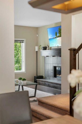 360 Marquis Heights Se, Calgary, AB - Indoor Photo Showing Other Room With Fireplace