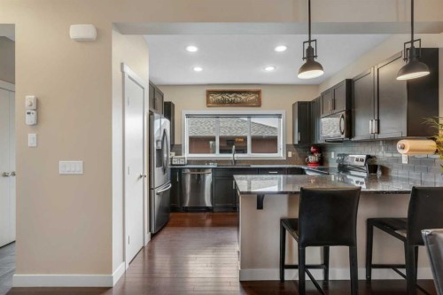 360 Marquis Heights Se, Calgary, AB - Indoor Photo Showing Kitchen With Upgraded Kitchen