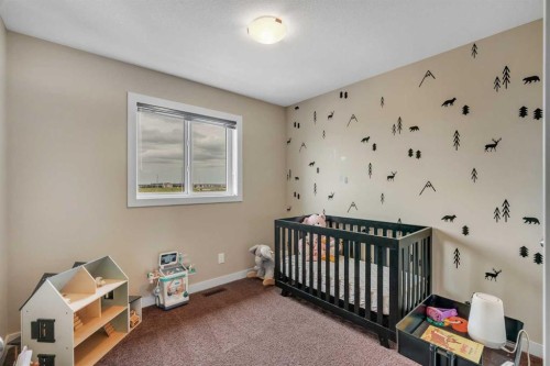 360 Marquis Heights Se, Calgary, AB - Indoor Photo Showing Bedroom
