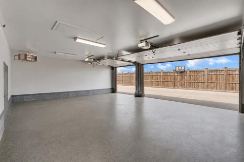 360 Marquis Heights Se, Calgary, AB - Indoor Photo Showing Garage