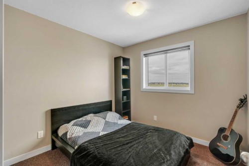 360 Marquis Heights Se, Calgary, AB - Indoor Photo Showing Bedroom