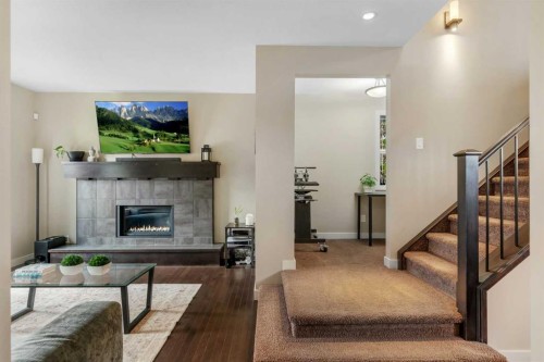 360 Marquis Heights Se, Calgary, AB - Indoor With Fireplace