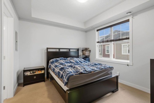 218 Cranford Se, Calgary, AB - Indoor Photo Showing Bedroom