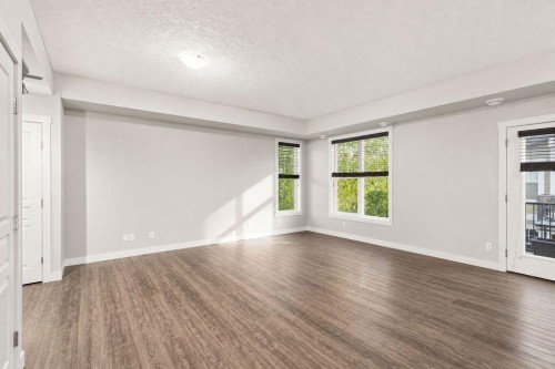 218 Cranford Se, Calgary, AB - Indoor Photo Showing Other Room