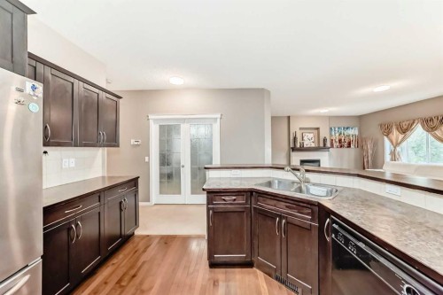 2092 Reunion Boulevard Nw, Airdrie, AB - Indoor Photo Showing Kitchen With Double Sink
