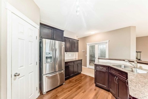 2092 Reunion Boulevard Nw, Airdrie, AB - Indoor Photo Showing Kitchen With Double Sink