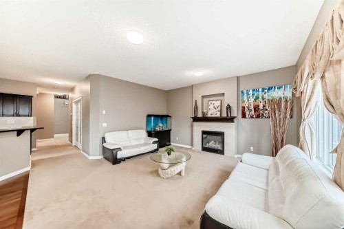 2092 Reunion Boulevard Nw, Airdrie, AB - Indoor Photo Showing Living Room With Fireplace