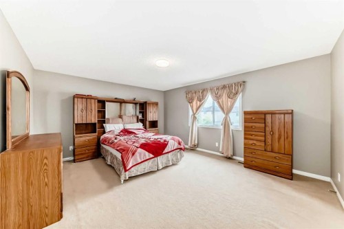 2092 Reunion Boulevard Nw, Airdrie, AB - Indoor Photo Showing Bedroom