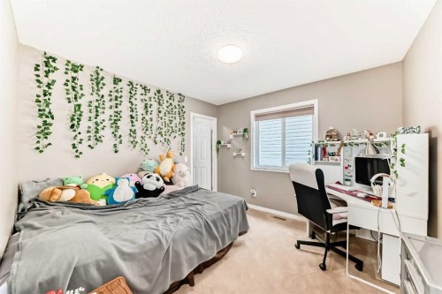 2092 Reunion Boulevard Nw, Airdrie, AB - Indoor Photo Showing Bedroom