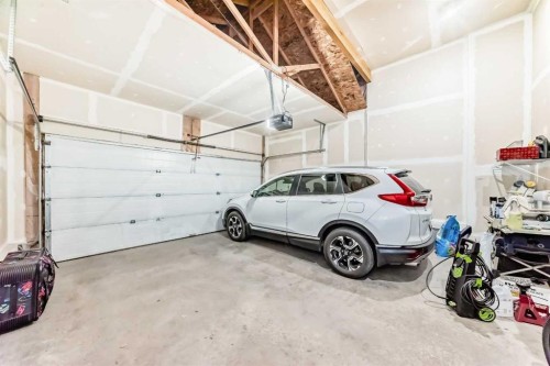 2092 Reunion Boulevard Nw, Airdrie, AB - Indoor Photo Showing Garage