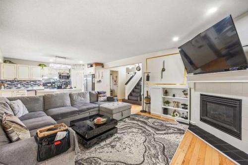 58 Citadel Crest Circle Nw, Calgary, AB - Indoor Photo Showing Living Room With Fireplace