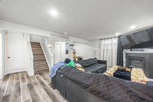58 Citadel Crest Circle Nw, Calgary, AB - Indoor With Fireplace