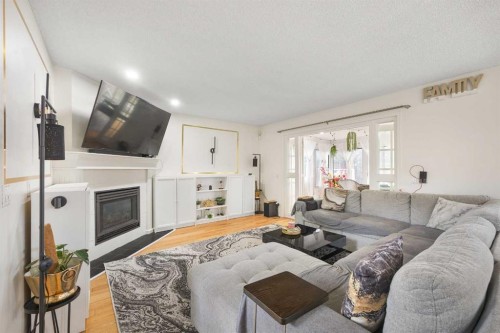 58 Citadel Crest Circle Nw, Calgary, AB - Indoor Photo Showing Living Room With Fireplace