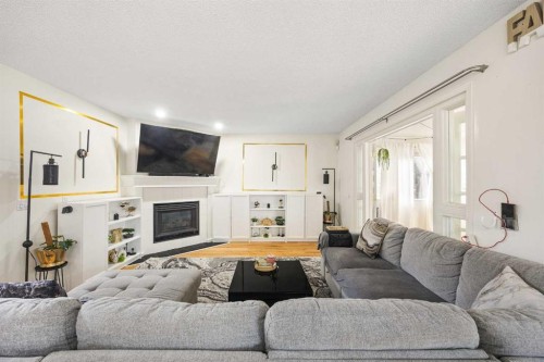 58 Citadel Crest Circle Nw, Calgary, AB - Indoor Photo Showing Living Room With Fireplace