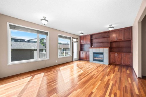 3906 2 Street Nw, Calgary, AB - Indoor Photo Showing Living Room With Fireplace