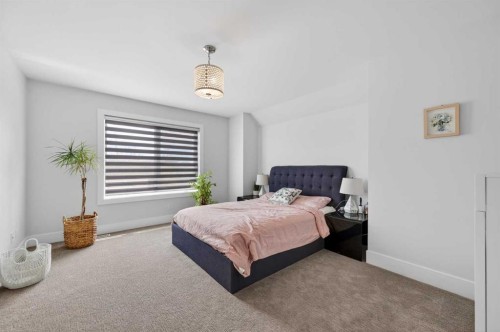 168 Posthill Drive Sw, Calgary, AB - Indoor Photo Showing Bedroom