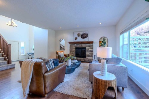 1835 Evergreen Drive Sw, Calgary, AB - Indoor Photo Showing Living Room With Fireplace