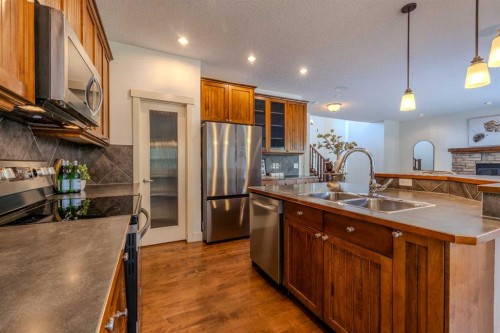 1835 Evergreen Drive Sw, Calgary, AB - Indoor Photo Showing Kitchen With Stainless Steel Kitchen With Double Sink