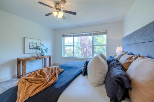 1835 Evergreen Drive Sw, Calgary, AB - Indoor Photo Showing Bedroom
