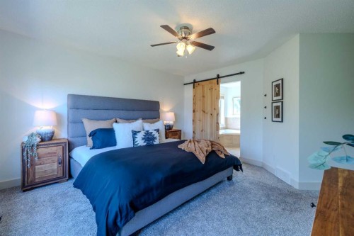 1835 Evergreen Drive Sw, Calgary, AB - Indoor Photo Showing Bedroom