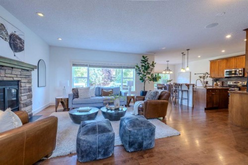 1835 Evergreen Drive Sw, Calgary, AB - Indoor Photo Showing Living Room With Fireplace