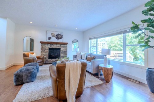 1835 Evergreen Drive Sw, Calgary, AB - Indoor Photo Showing Living Room With Fireplace
