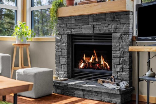 13-242 Benchlands Terrace, Canmore, AB - Indoor With Fireplace